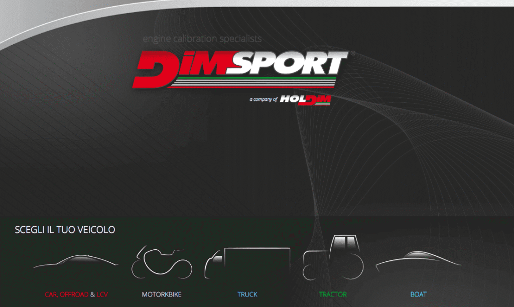 Race Evo tuning software interface open, displaying labeled calibration maps with Dimsport New Genius hardware nearby. Professional ECU tuning software setup